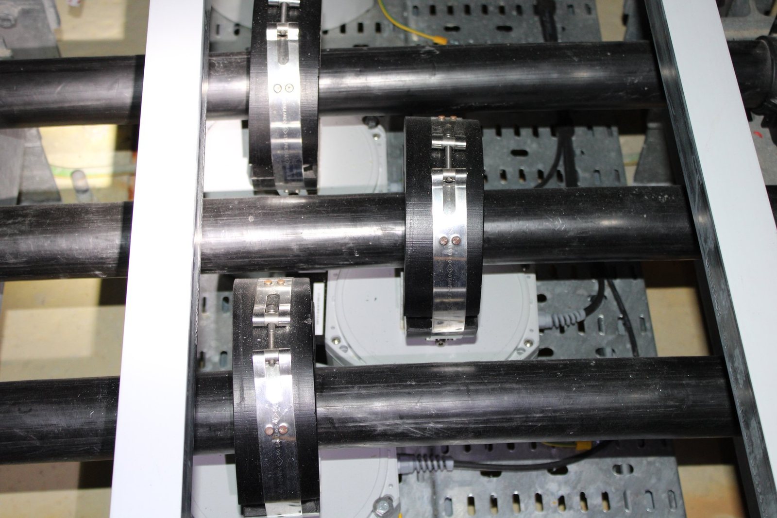 Split-core current transformers fitted around each HV cable for retrofit without disconnection